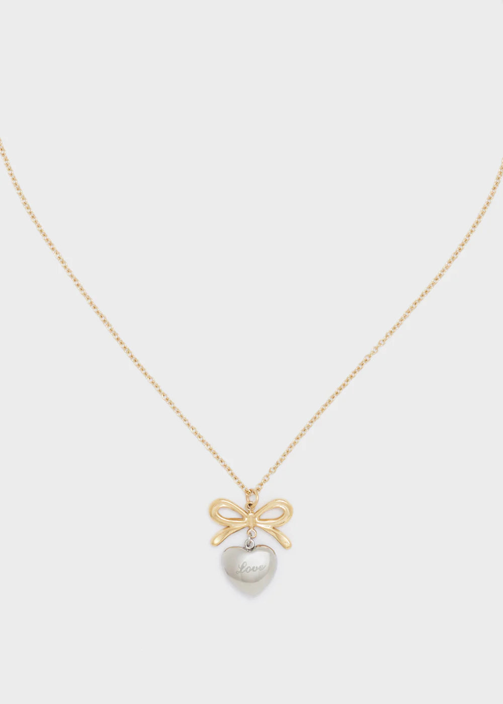 COLLANA FIOCCO E CUORE ACC. INOS. ORO/ARG. - Nalì